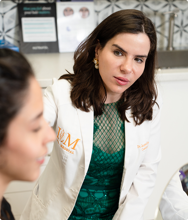 Dr. Jacquelline Leva consulting with a patient