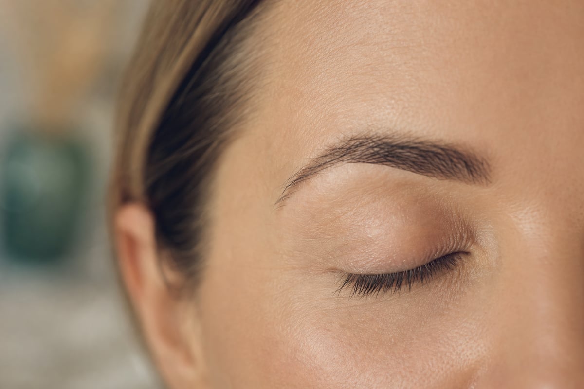 Illustrative image of a close-up of a serene closed eye and brow; not a Leva patient